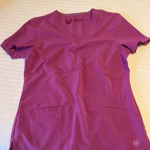 Urbane performance scrub top